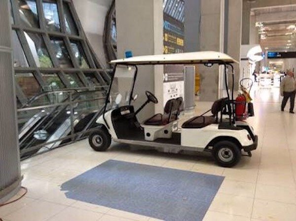 Airport buggy service at Suvarnabhumi BKK — electric cart transport from gate to immigration